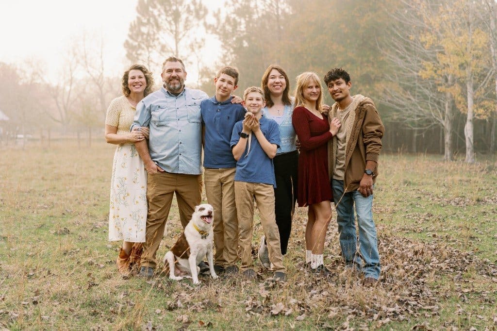 The Cirlot family and their dog outdoors in 2026